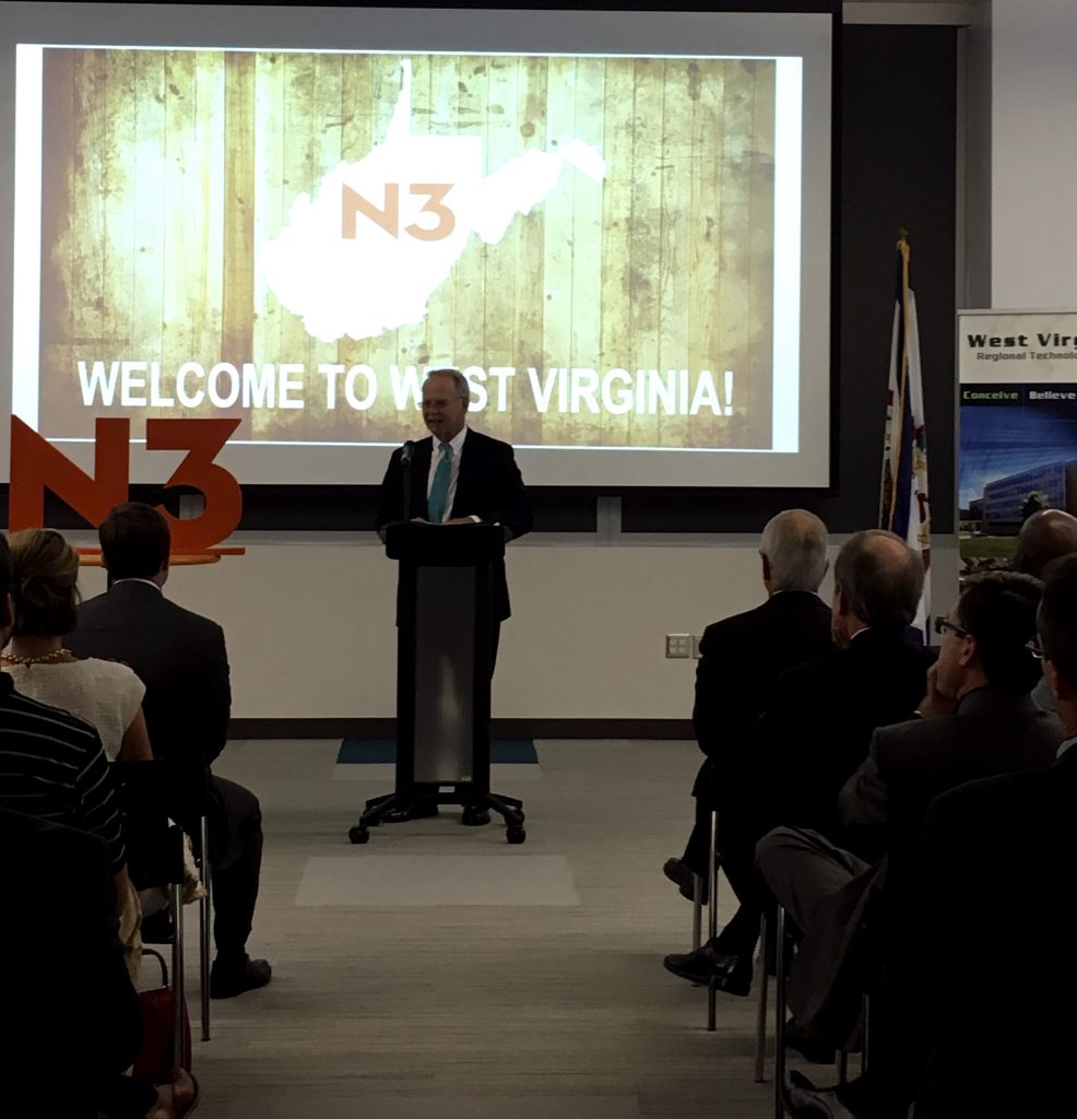 Dr. Paul Hill welcomes representatives from N3, the newest company to locate at the West Virginia Regional Technology Park. 